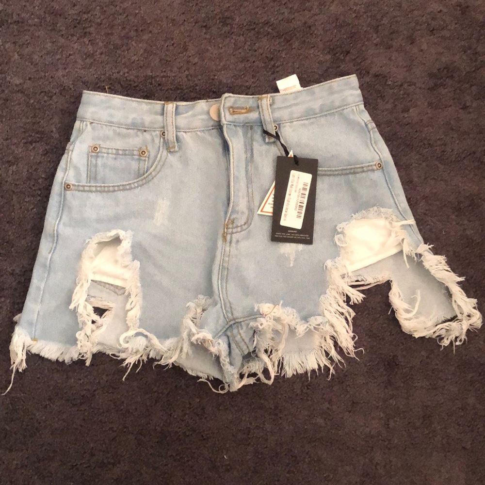 Light Blue wash extreme thigh Rip denim shorts